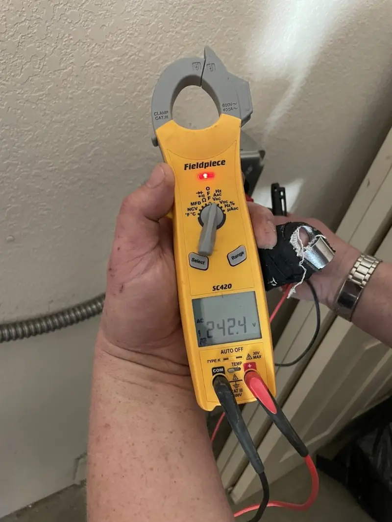 Voltage testing with clamp meter during Whole House Surge Protector in Vidor